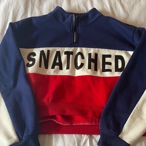 “SNATCHED” sweatshirt.